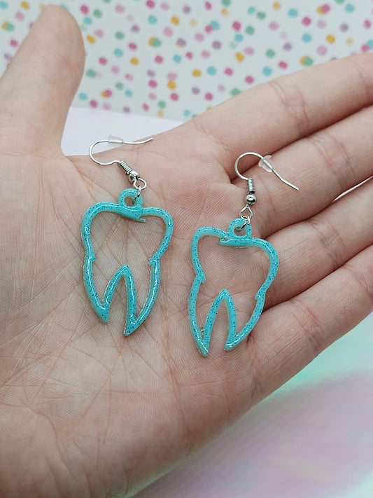 Boucles d’oreilles dents bleu